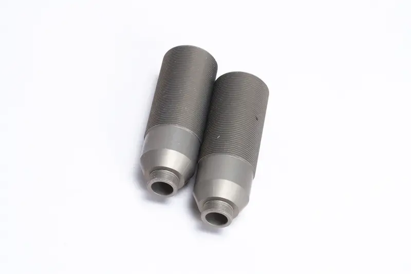 Mugen Seiki 16Mm Front Damper Case (2) *Discontinued 1